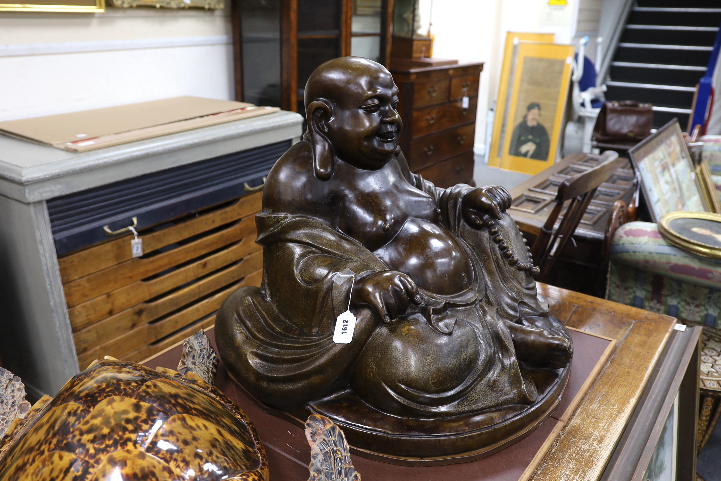 A massive Chinese bronze seated figure of Budai, 62cm high